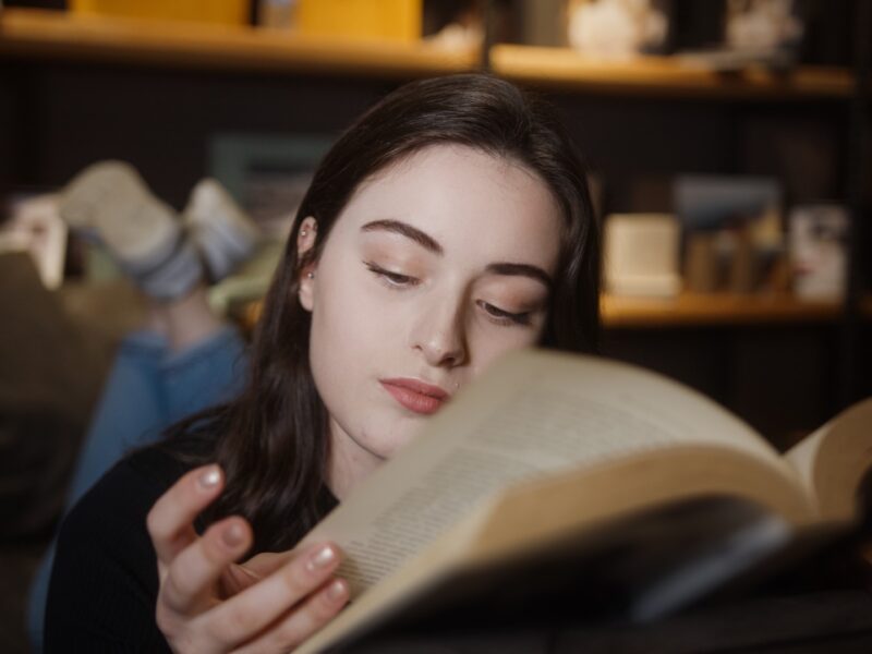 Featured image for 10 Unique Intellectual Hobbies to Try - there is a woman reading