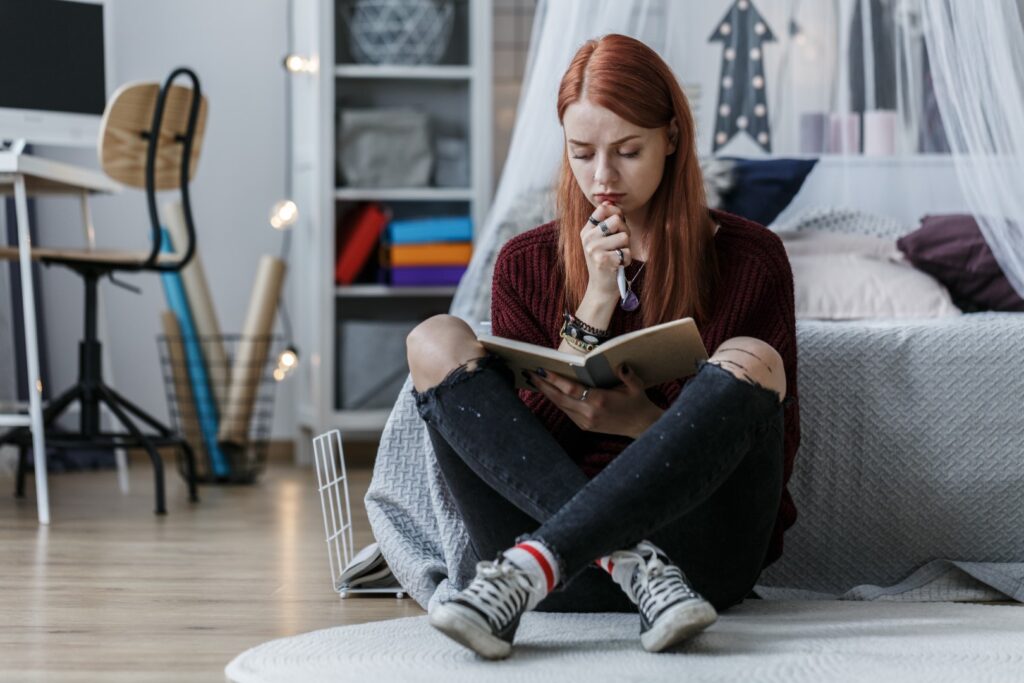 Girl journaling for a hobby