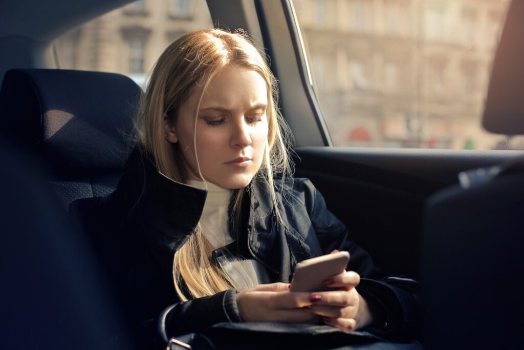 Girl on her phone possibly learning a new language as an intullectual hobby